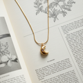 Moon Star Necklace on Book